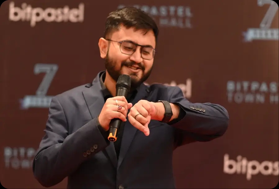 Bitpastel Townhall cake cutting with team members