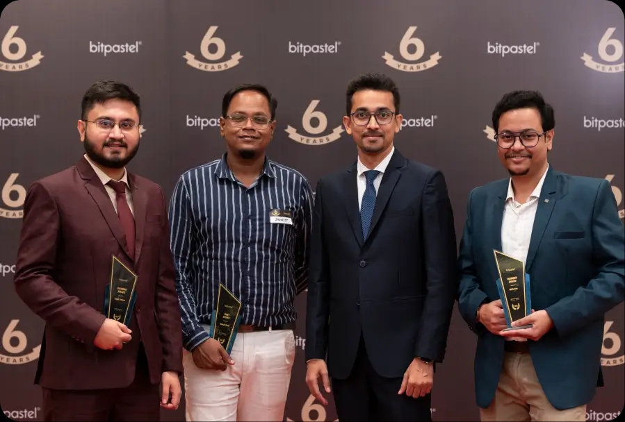 Bitpastel Townhall cake cutting with team members